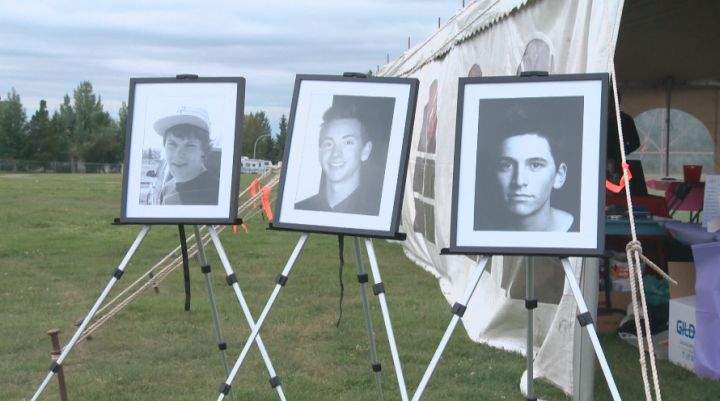 Bradley Arsenault, Kole Novak, and Thaddeus Lake, show in a picture from a memorial held for the young men in September 2012.