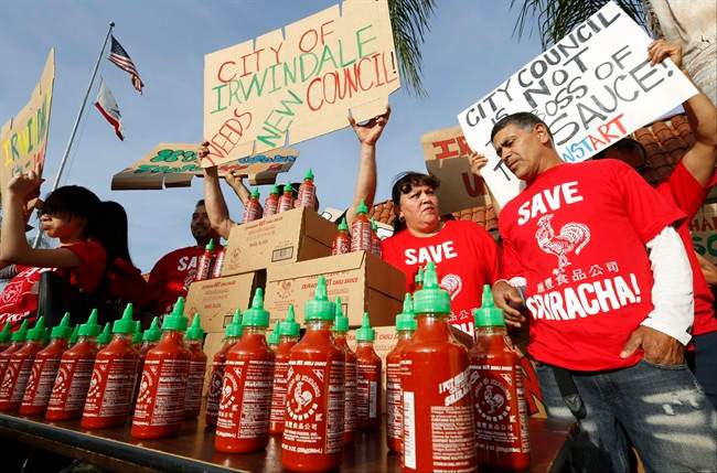 Sriracha hot sauce workers protest ahead of the city council meeting in Irwindale, Calif., Wednesday, April 23, 2014.
