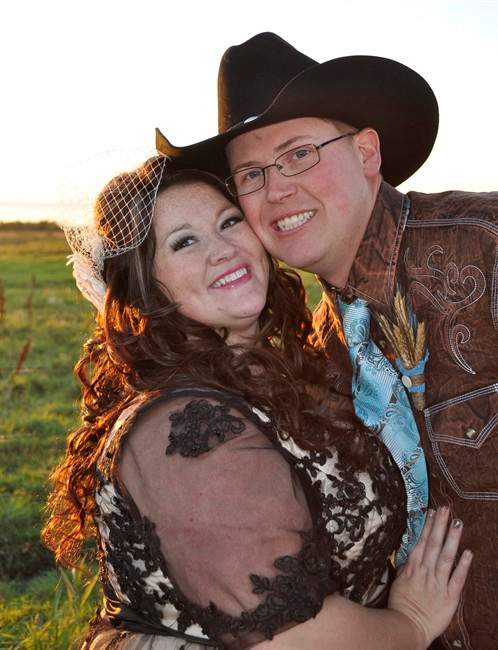 Chelsea and Daniel Seitz pose at their wedding on Sept. 28, 2013 Pierson, Man.