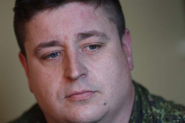 Afghanistan veteran Cpl. Jamie MacWhirter poses for a photo at home in Goulds, N.L. on Tuesday, July 30, 2013.