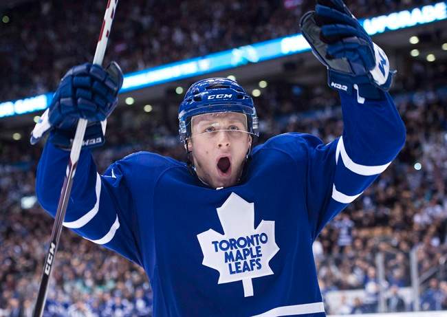 Toronto Maple Leafs defenceman Morgan Rielly celebrates his goal against the Buffalo Sabres during second period NHL hockey action in Toronto on Wednesday, January 15, 2014.