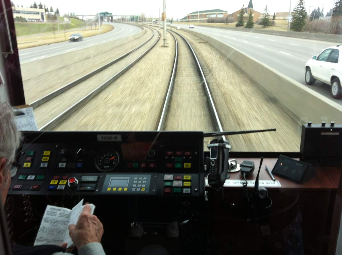 Calgary Transit is investigating after a rider took a photo of a Ctrain driver who appeared to be reading while operating a train.