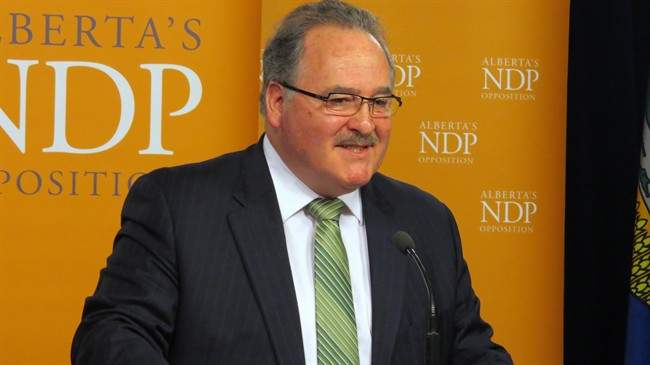 Alberta NDP Leader Brian Mason announces he will step down as party leader at the legislature in Edmonton on Tuesday, Oct. 19, 2014. Mason says there's a window of opportunity to capture more progressive voters but a fresh face at the helm is needed to do it.