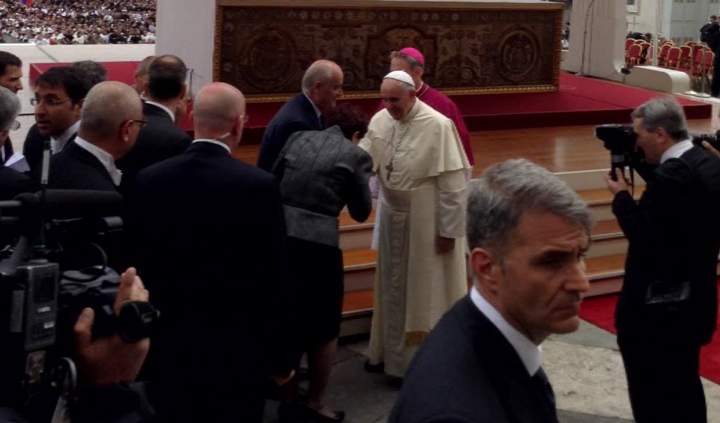 Veteran Affairs Minister Julian Fantino and his wife greet Pope Francis in Rome’s St. Peter’s Square on April 27, 2014.