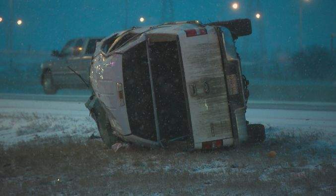 A single vehicle rollover on the Anthony Henday ends with a truck on its roof, Thursday, April 17, 2014.