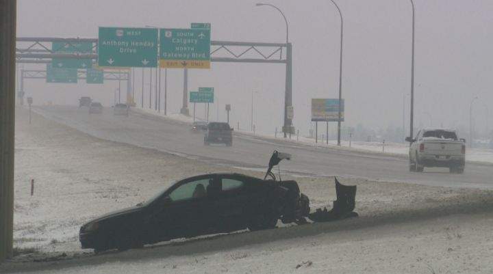 A car hit the ditch off Anthony Henday Drive, near 91 Street, in south Edmonton Friday, April 18, 2014.