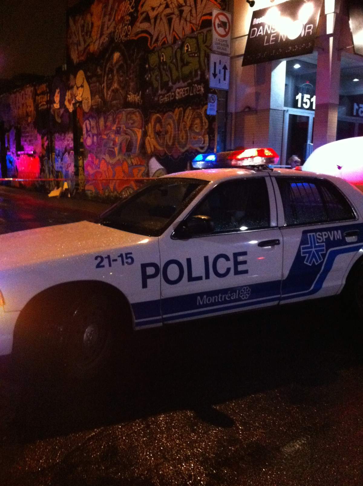 A Montreal Police car blocks a road following a shooting at the Parti Quebecois 2012 election night party.