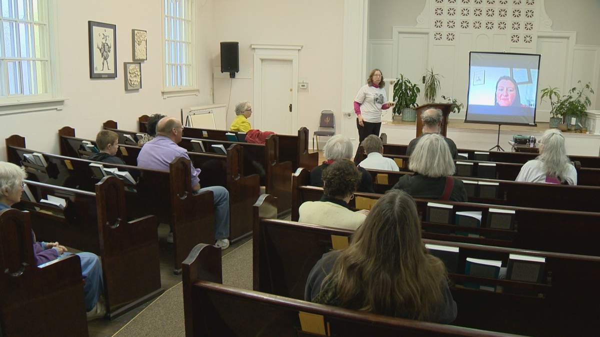 Friends of the Regina Public Library celebrate in Unitarian Centre Saturday afternoon.
