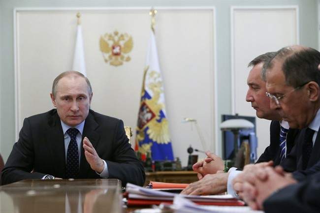 Russian President Vladimir Putin speaks at a Cabinet meeting in the Novo-Ogaryovo residence outside Moscow, Wednesday, April 9, 2014. 