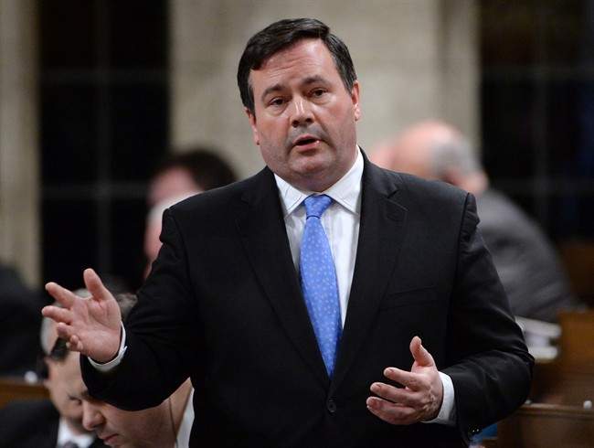 Minister of Employment and Social Development Jason Kenney responds to a question during question period in the House of Commons on Parliament Hill in Ottawa on Monday, April 28, 2014. 