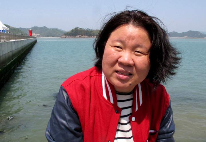 In this Monday, April 21, 2014 photo, Lim Son-mi, 50, who works at a daycare center in Ansan, speaks during an interview in Jindo, South Korea. Her daughter Park Hye-son is among the 302 people dead or missing in last week’s South Korean ferry disaster. She said her 16-year-old daughter Hye-son wanted to be a television screenwriter. But Lim’s wages from working at a daycare center meant she didn’t have enough money to send her younger daughter to the writing academy she’d wanted to attend.