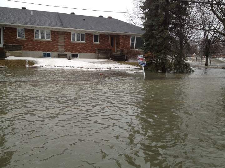 Rising waters caused by rainfall and snow thaw have caused flooding in the village of St-Clet in Vaudreuil-Soulanges on April 8, 2014.