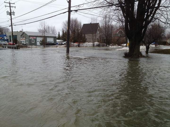 Rising waters caused by rainfall and snow thaw have caused flooding in the village of St-Clet in Vaudreuil-Soulanges on April 8, 2014.