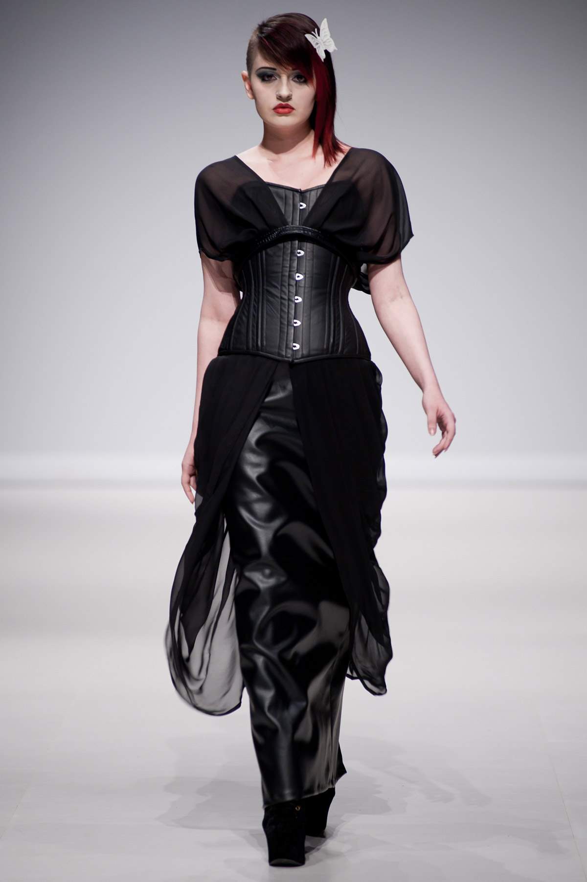 Tues. April 22, 2014: Starkers Corsetry sent a troop of models down the FAT 2014 runway, outfitted in wares with a decidedly tech-minded edge.