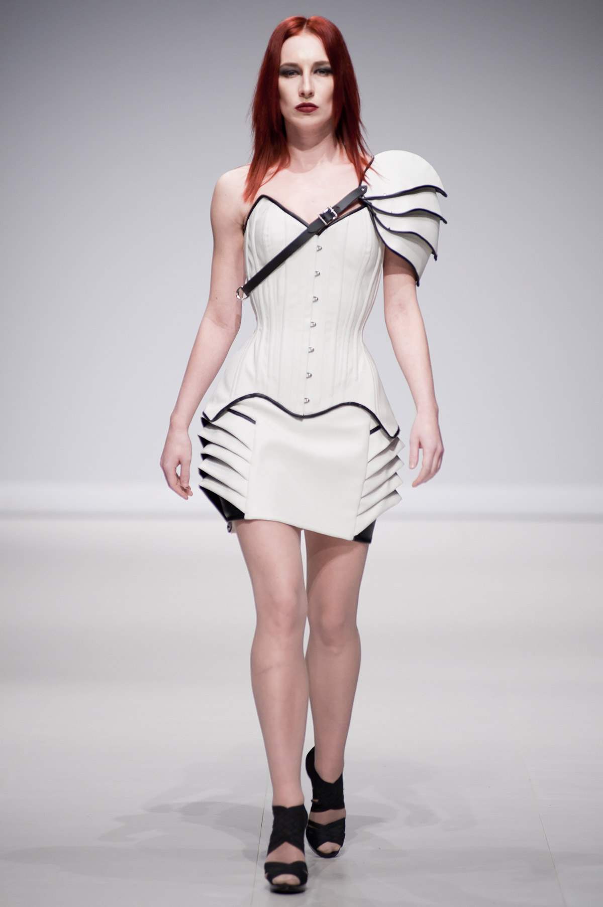 Tues. April 22, 2014: Starkers Corsetry sent a troop of models down the FAT 2014 runway, outfitted in wares with a decidedly tech-minded edge.