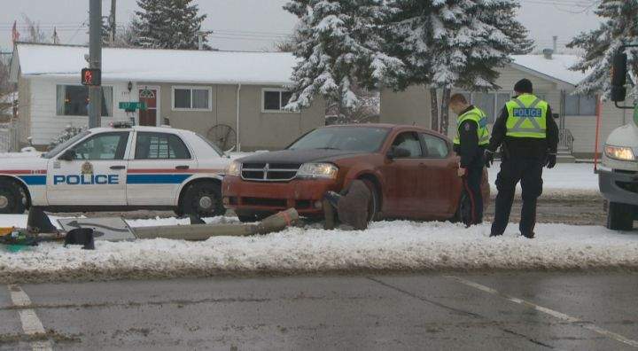 A car slammed into a light standard in the area of 137 Avenue and 68 Street Friday, April 18, 2014.