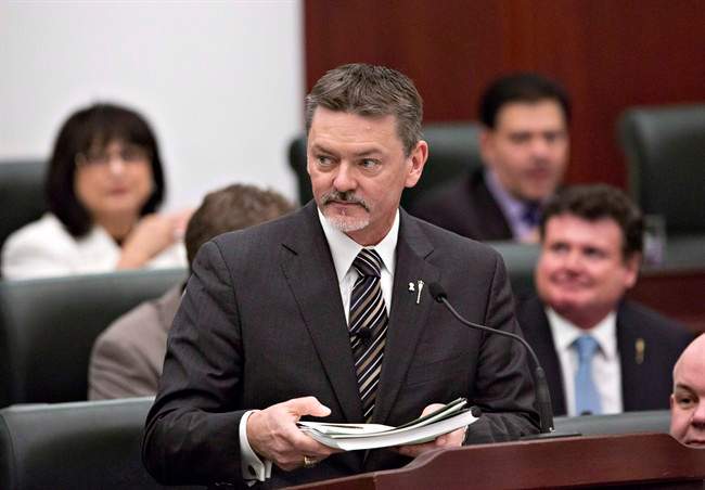 Albert President of Treasury Board and Minister of Finance Doug Horner delivers the budget in Edmonton, Alberta on Thursday March 6, 2014. Horner says he won't seek the leadership of the governing Progressive Conservatives.