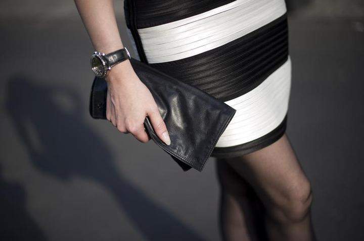 The "It" bag's star burned too bright. Must-have handbags have given way to something more enduring: signature bags.