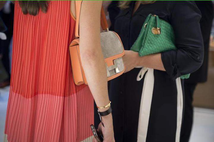 The "It" bag's star burned too bright. Must-have handbags have given way to something more enduring: signature bags.