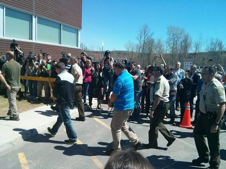 Three former Montreal Maine and Atlantic Railway Ltd. employees were escorted by police to appear in court in Lac-Megantic, Que., on Tuesday, May 13, 2014.
