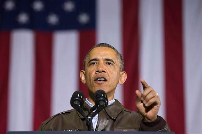 President Barack Obama gestures while speaking to troops at Bagram Air Field north of Kabul, Afghanistan, during an unannounced visit, on Sunday, May 25, 2014. 