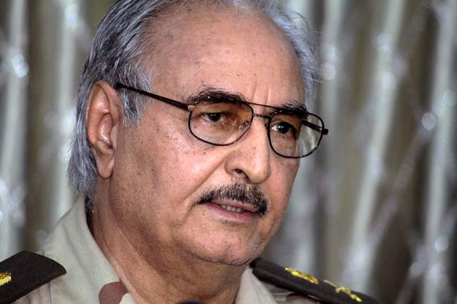 In this Saturday, May 17, 2014 photo, Libyan Gen. Khalifa Hifter addresses a press conference in Benghazi, Libya. 