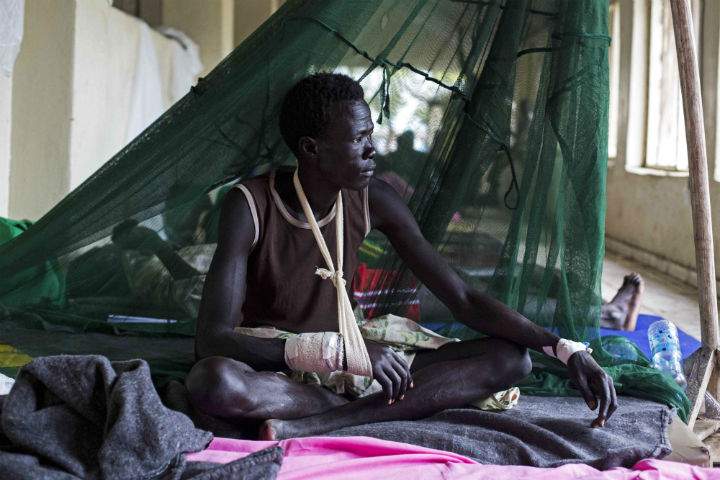 A man injured during tribal clashes that erupted in Jonglei State, sits in a hospital in Bor, South Sudan on July 15.