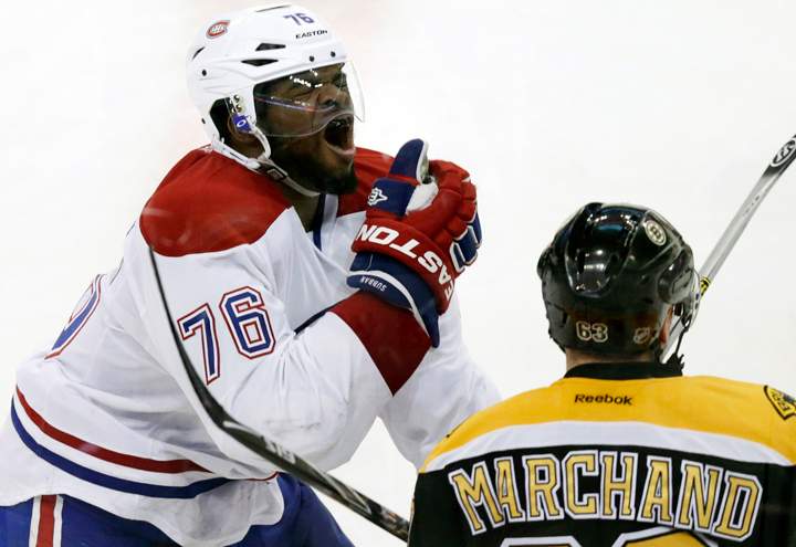 Montreal Canadiens defenseman P.K. Subban (76) reacts after getting hit in the face by Boston Bruins left wing Brad Marchand's stick during the second period of Game 1 in a second-round of a Stanley Cup playoff series in Boston, Thursday, May 1, 2014.