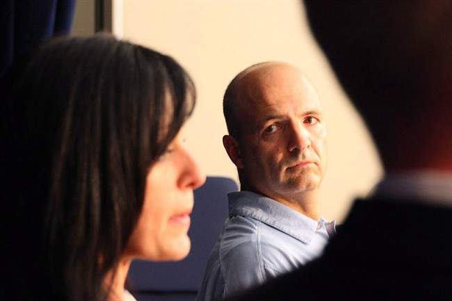 Tabitha Speer, widow of Sgt. 1st Class Chris Speer, and former sergeant Layne Morris speak to reporters on the sentencing of Omar Khadr at his military commission at Guantanamo Bay, Cuba on Sunday Oct. 31, 2010. 
