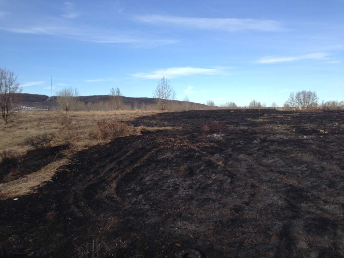 Damage left behind from a fast-moving grass fire on Wednesday, April 30th, 2014.