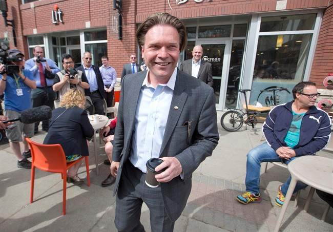 Thomas Lukaszuk walks away after a press conference officially launching his campaign for the Alberta Progressive Conservative leadership, in Edmonton, Alberta on Thursday May 22, 2014.
