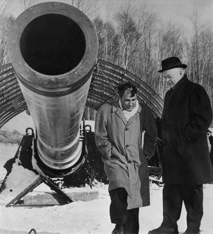 Canadian scientist Gerald Bull (left) and former Quebec Premier Jean Lesage inspect a projectile gun developed at McGill University’s space research centre at Highwater, Que. on January 19, 1965.