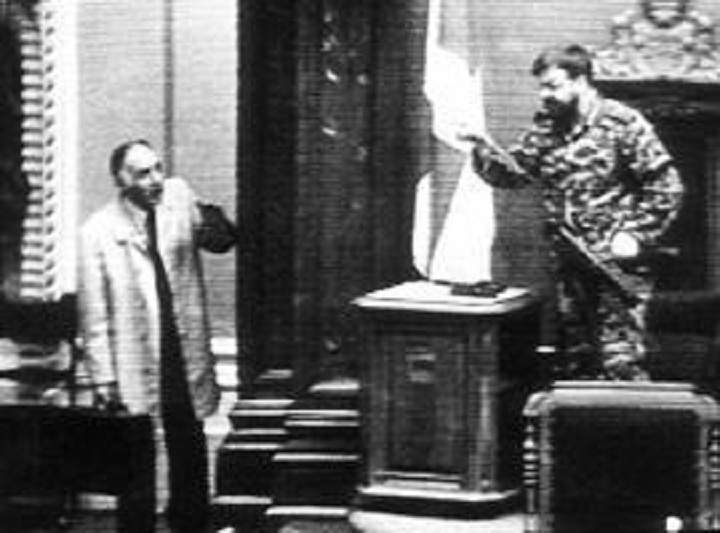 Sergeant-at-Arms and retired army major, René Marc Jalbert talks with Canadian Forces Corporal Denis Lortie in Quebec’s National Assembly on May 8, 1984.