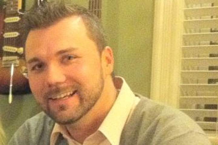 The former director of communications for Nova Scotia's premier has pleaded guilty to assault.