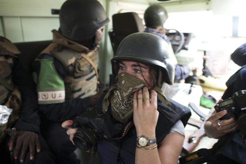 Picture taken in Bangui on February, 19, 2014 of French journalist Camille Lepage. French journalist Camille Lepage, 26, has been killed while on a reporting assignment in Central African Republic, French President Francois Hollande said on May 13, 2014 in a statement, vowing to make every effort to shed light on the murder. AFP PHOTO / FRED DUFOUR     .