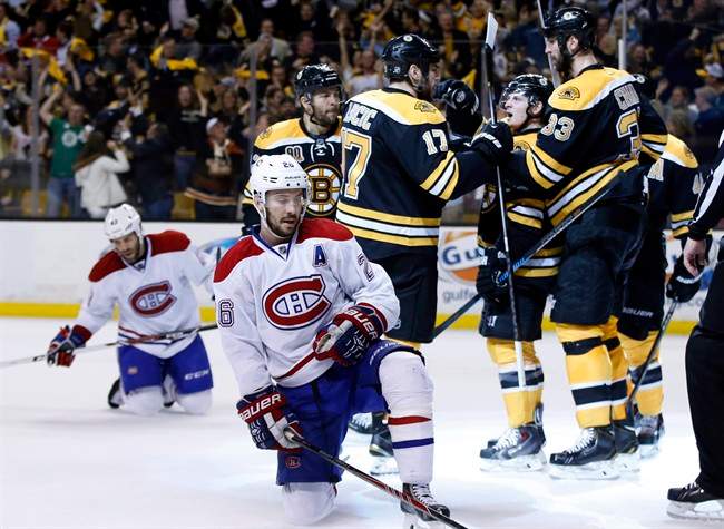 Montreal Canadiens defensemen Josh Gorges and Mike Weaver.