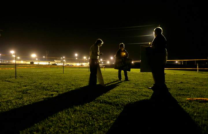 A group of death penalty opponents hold a vigil Tuesday, May 20, 2014, outside the prison where Missouri death row inmate Russell Bucklew was scheduled to be executed in Bonne Terre, Mo. 