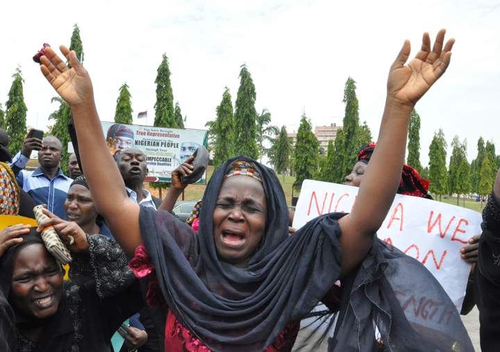 An unidentified mother cries out during a demonstration with others who have daughters among the kidnapped school girls.