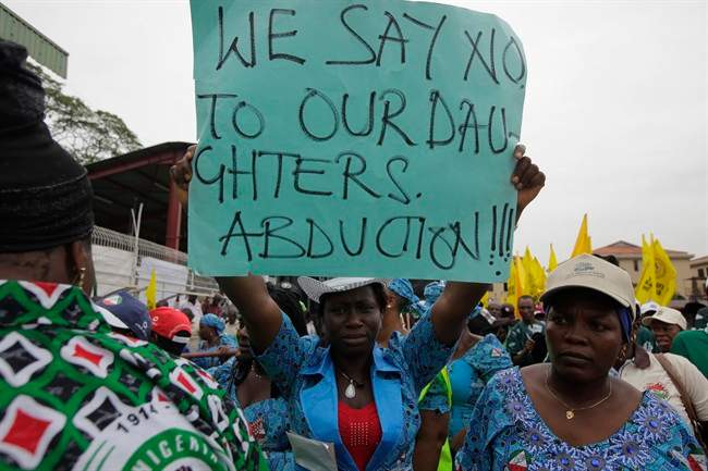 Hundreds of schoolgirls were abducted by the Nigerian Islamic insurgent group Boko Haram and are to be sold as "slaves," the group's leader said.