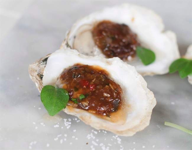 Oysters on the grill are a fine start to summer