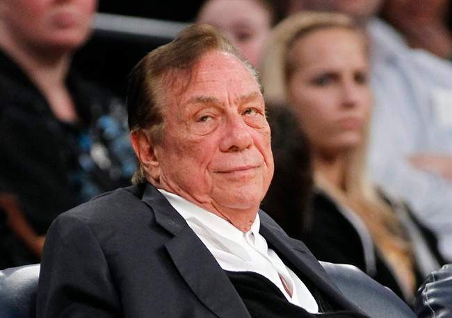 This is a Dec. 19, 2011 file photo showing Los Angeles Clippers owner Donald Sterling watching the Clippers play the Los Angeles Lakers during an NBA preseason basketball game in Los Angeles.