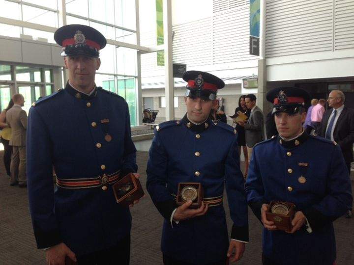 Three EPS officers honoured for jumping into cold, murky water last summer to save a person from their vehicle.