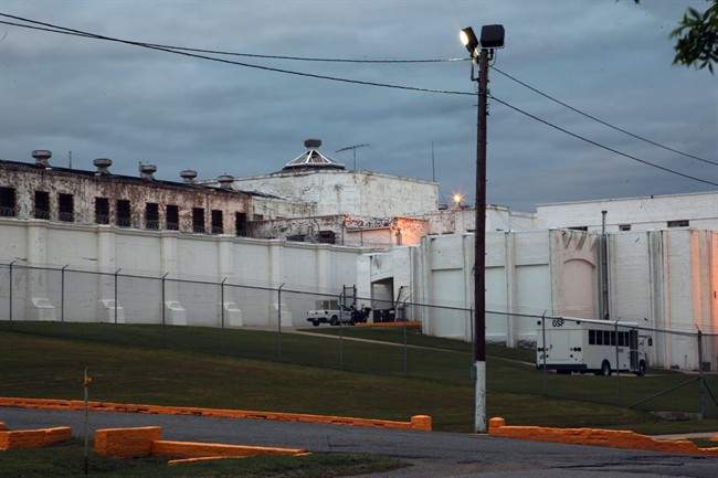 This April 29, 2014 photo shows the Oklahoma State Penitentiary in McAlester, Okla. after Robert Patton stopped the execution of Clayton Lockett. 