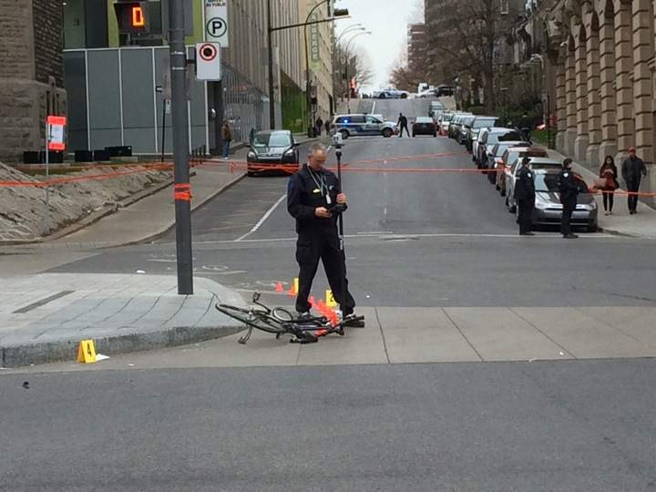 Montreal police investigating at the scene of a bicycle accident on May 9, 2014.