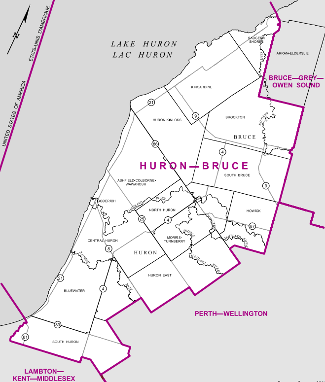 A large riding bordering Lake Huron, the district goes as far north as Southampton, and as far south as Exeter and the outskirts of Grand Bend. The towns of Port Elgin and Goderich, each with just over 7,500 people, are the largest population centres in the riding.