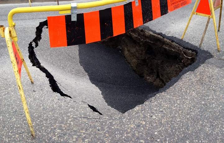 The southbound lanes of St. Mary’s Road shut down just before 3 p.m. Wednesday after a portion of the road caved in near Guay Park and Morier Avenue.