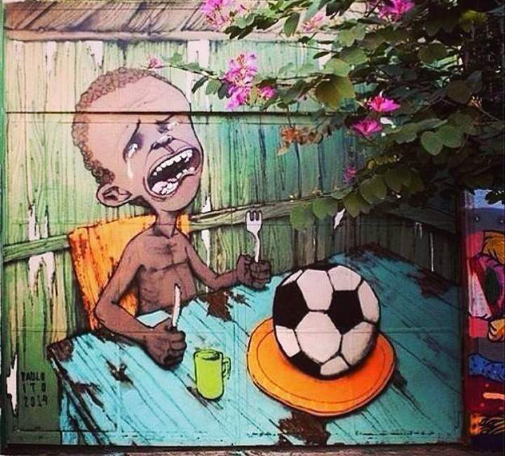 A painting of a starving child with soccer ball on his plate has gone viral.