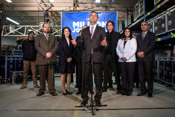 PC Leader Tim Hudak talks to the media at Metalworks Studios,