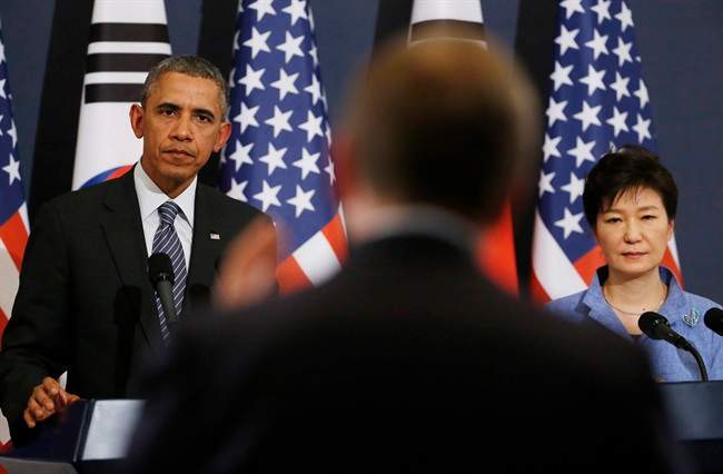 In this Friday, April 25, 2014 file photo, U.S. President Barack Obama, left, and South Korean President Park Geun-hye listen to a reporter's question during a joint news conference at the Blue House in Seoul, South Korea.