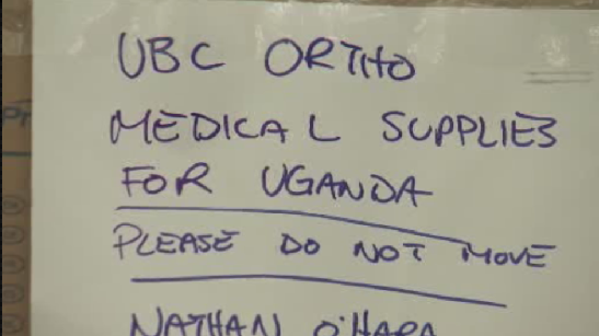 A package of used supplies from Vancouver General Hospital being prepared for Uganda.